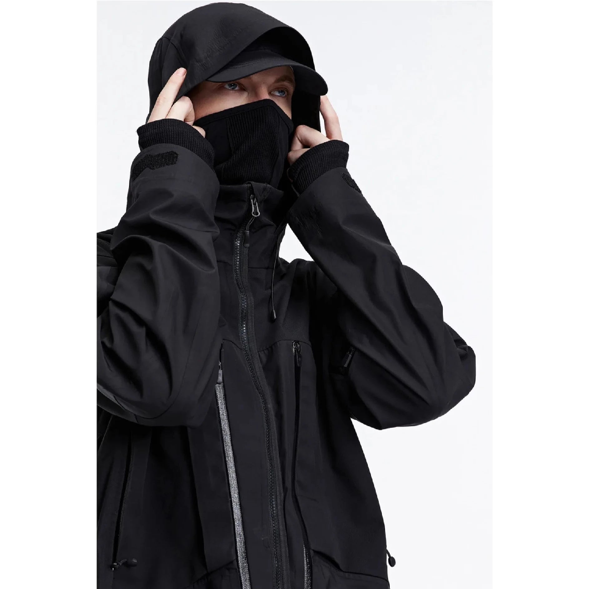 A man wearing The 0107 Ski Down Techwear Jacket in Black Color