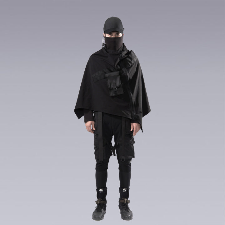 A man wearing the cyberpunk / techwear zip up black cape - Full outfit