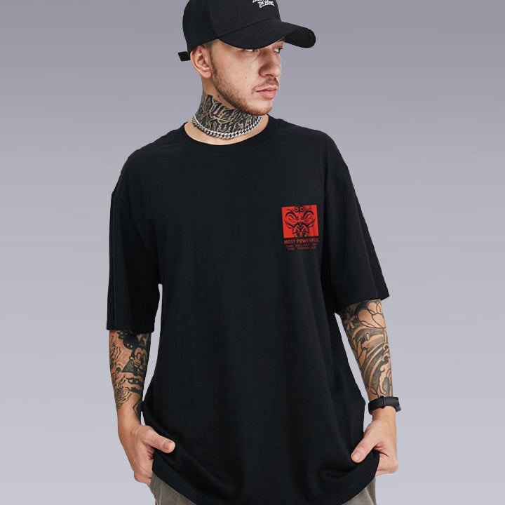 a tattooed Man wearing the UNISEX Kimura Sensei T-SHIRT in Black color