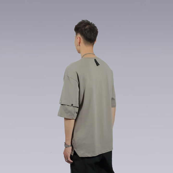 A man wearing the techwear shirt 3D cut, gray color by clotechnow